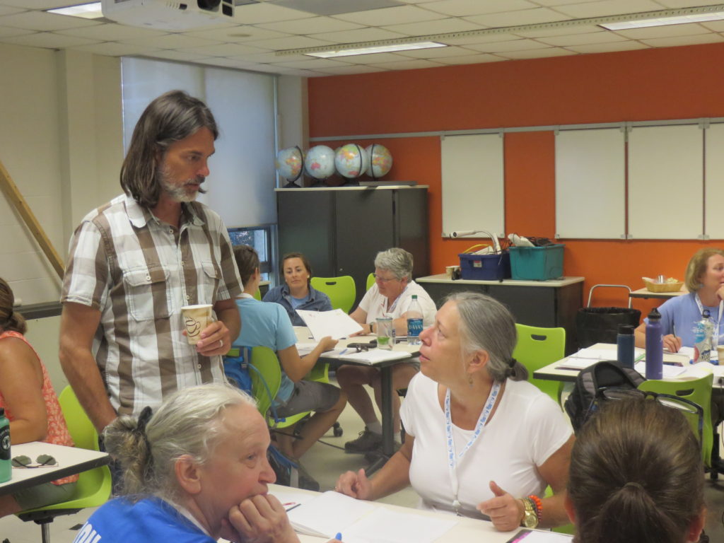 Researcher and teachers sharing knowledge